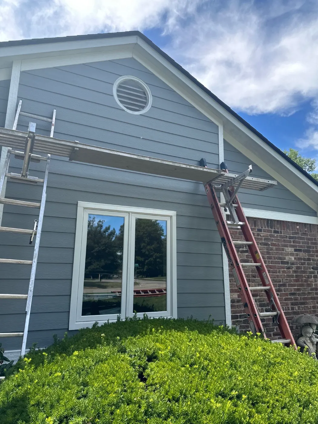 Storm-damaged siding documented in Southern Green
